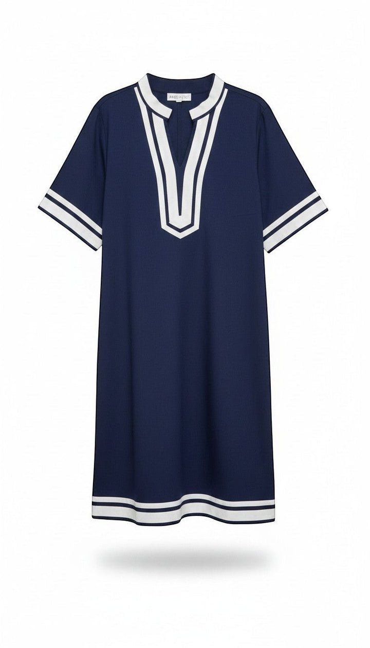 Chic Collective navy blue tunic dress with white trim on V-neck, short sleeves, and hem. Relaxed fit, knee-length.