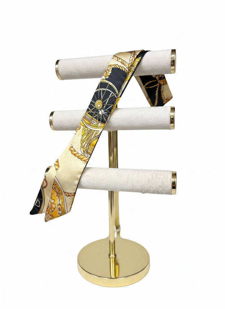 Chic Collective Noir Équestre Ribbon Tie scarf with black, ivory, and gold equestrian motifs. Silky satin finish.