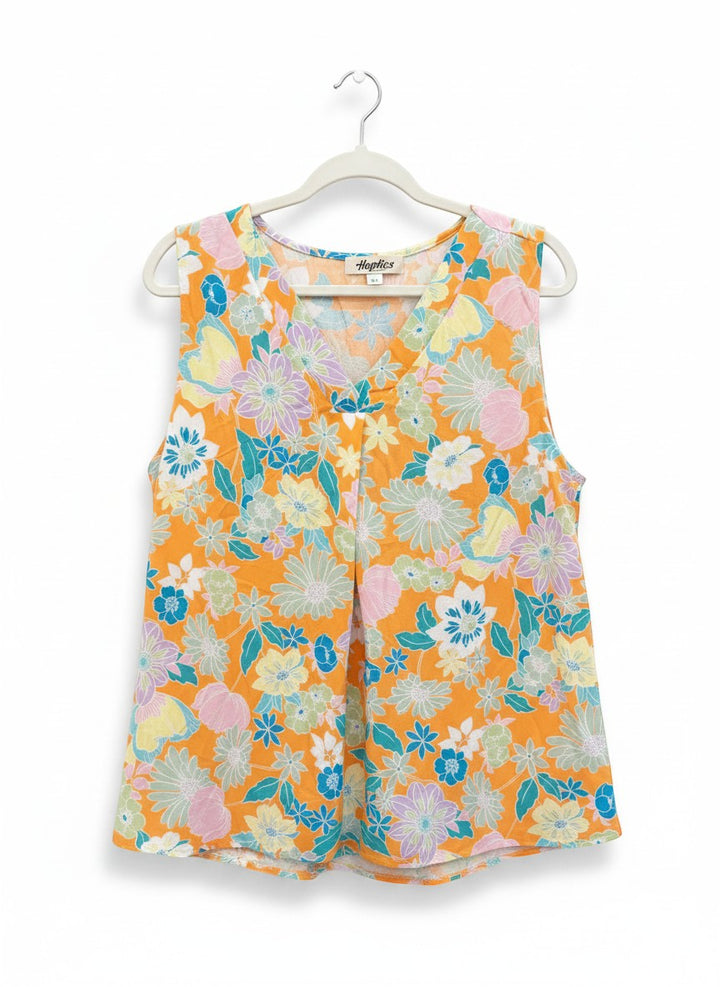 Chic Collective orange floral print sleeveless V-neck top with pink, blue, and yellow flowers.