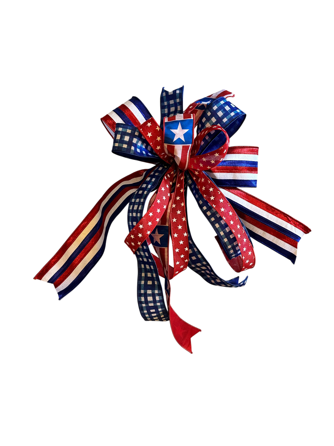 Chic Collective patriotic bow with red, white, and blue ribbons featuring stars and plaid patterns.