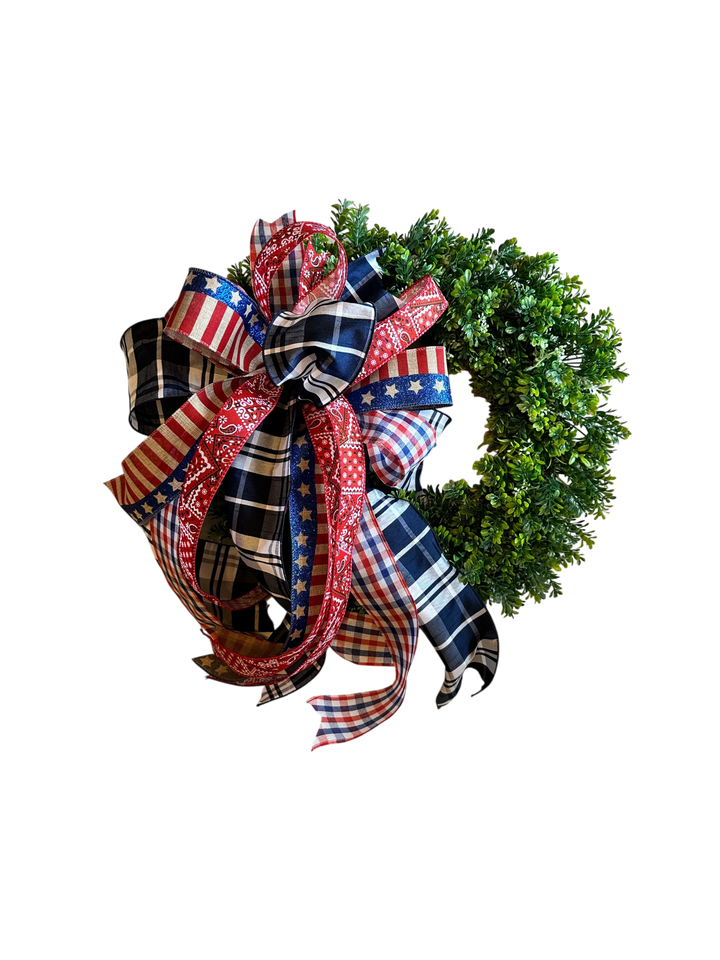Chic Collective patriotic bow for wreath with red, white, and blue plaid and star patterns.