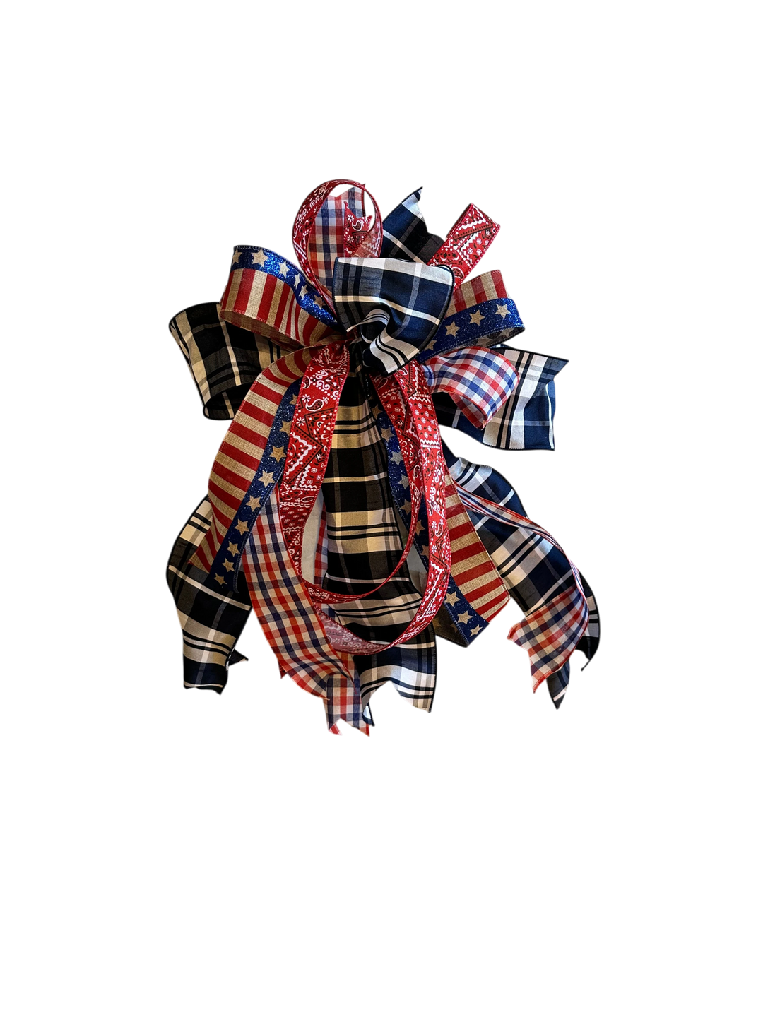 Chic Collective patriotic bow with red, white, and blue plaid and bandana patterns, stars, and stripes.
