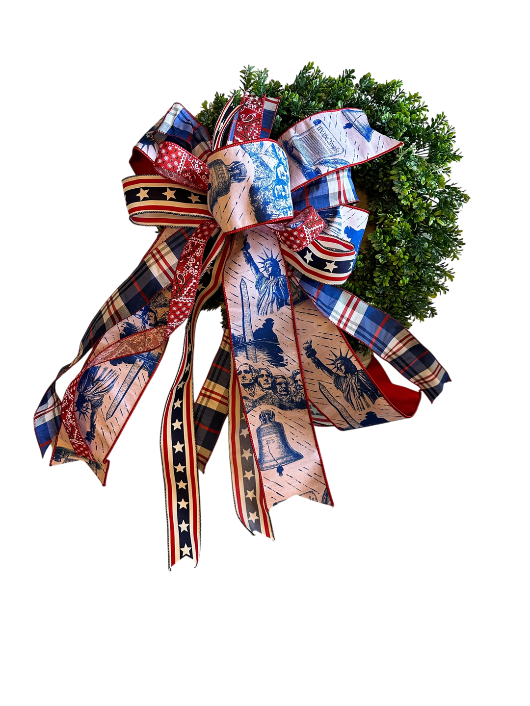 Chic Collective patriotic bow with Statue of Liberty, Mount Rushmore, and Liberty Bell prints on red, white, and blue ribbons.