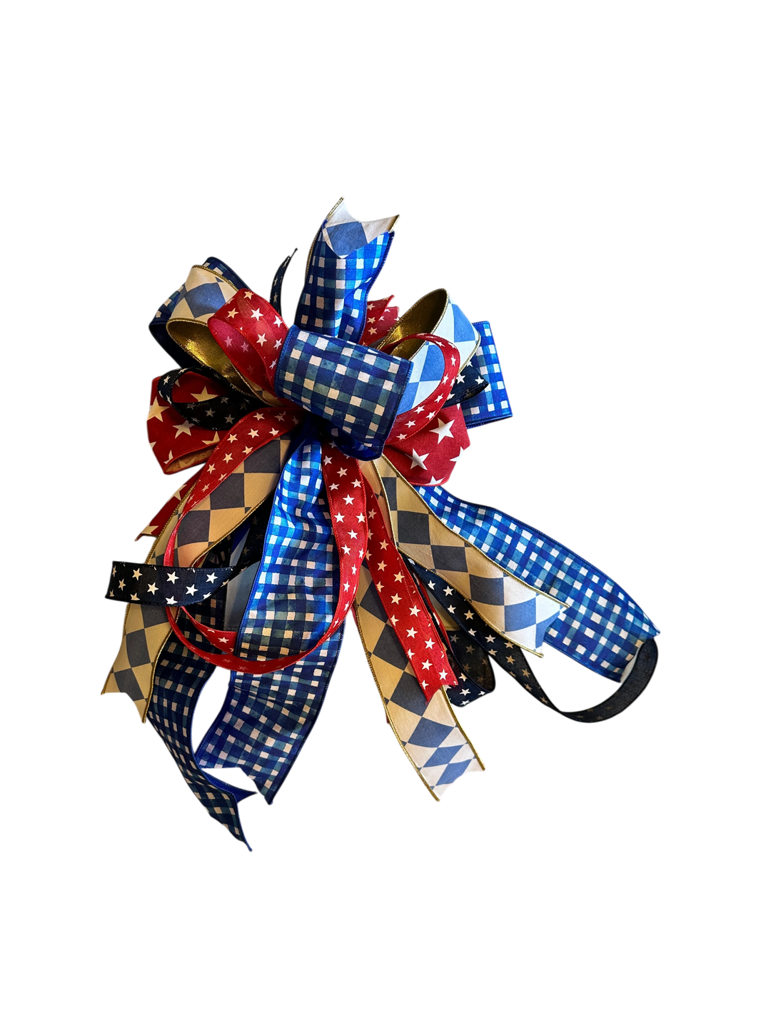 Chic Collective patriotic bow with red, white, and blue ribbons featuring stars and gingham patterns.
