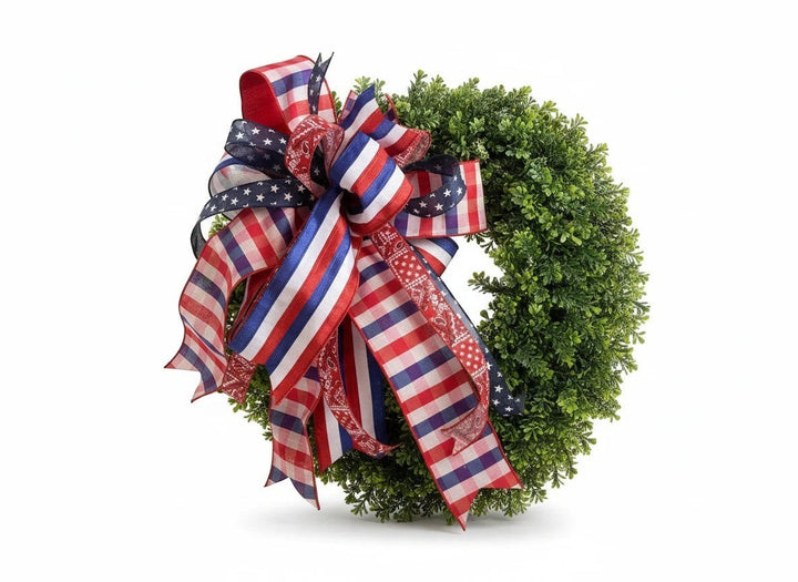 Chic Collective patriotic boxwood wreath with red, white, and blue star, stripe, gingham, and bandana print ribbons.