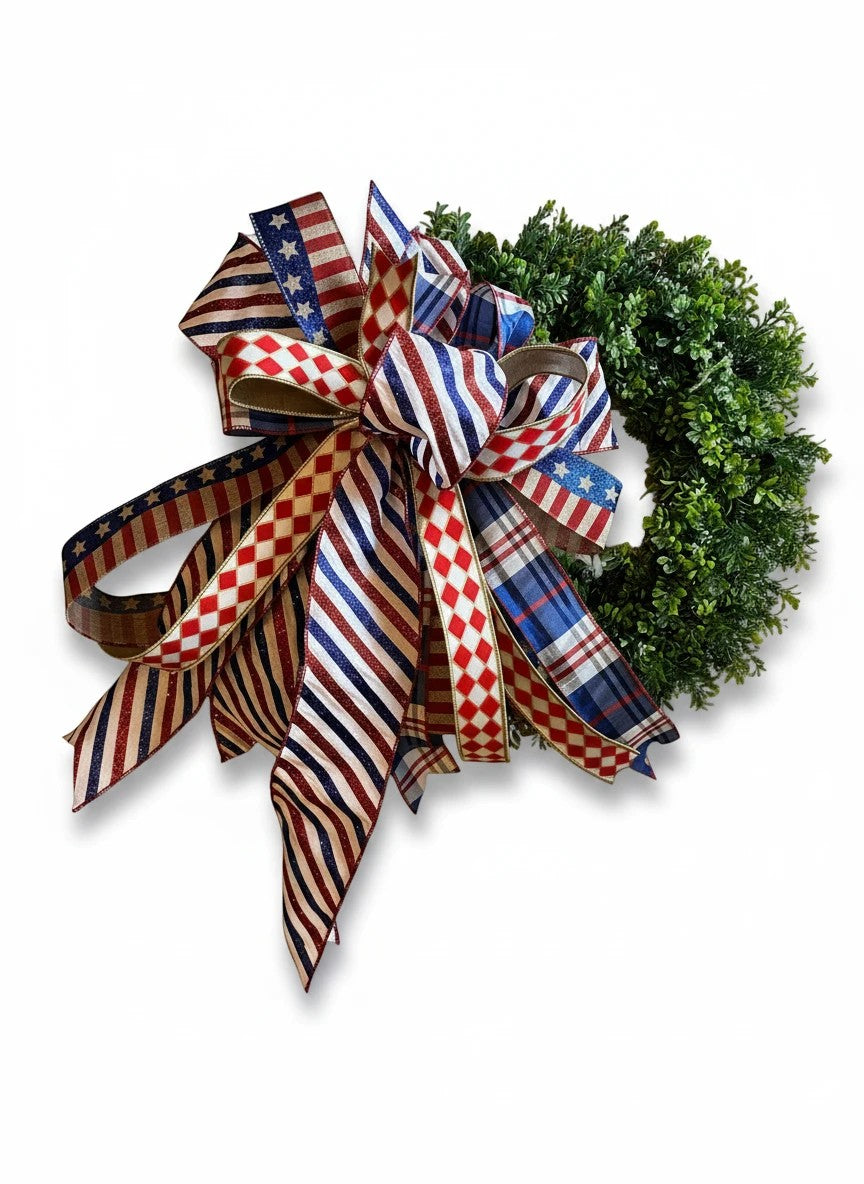 Chic Collective patriotic wreath bow decoration with red, white, and blue striped, plaid, and star ribbons.