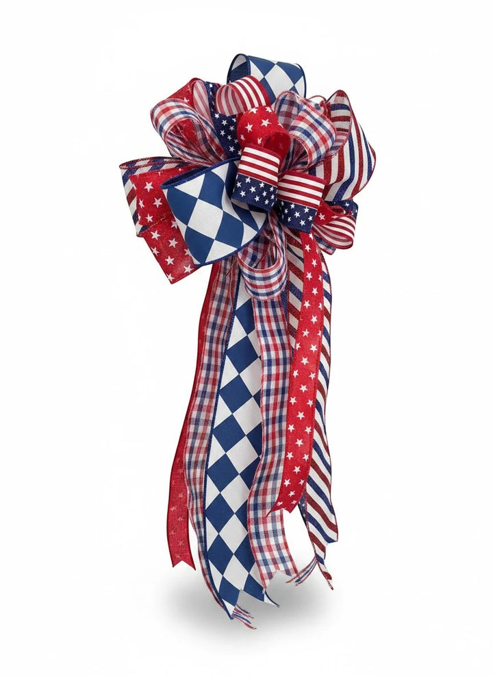 Chic Collective patriotic ribbon bow with red, white, and blue stars, stripes, gingham, and diamond patterns.