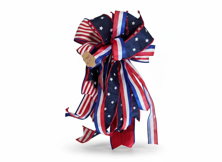 Chic Collective patriotic ribbon bow with red, white, and blue star and stripe patterns for holiday wreath decor
