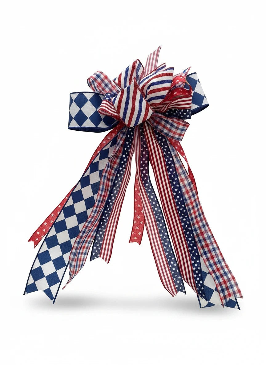 Chic Collective patriotic ribbon bow with red, white, and blue stars, stripes, gingham, and diamond patterns.