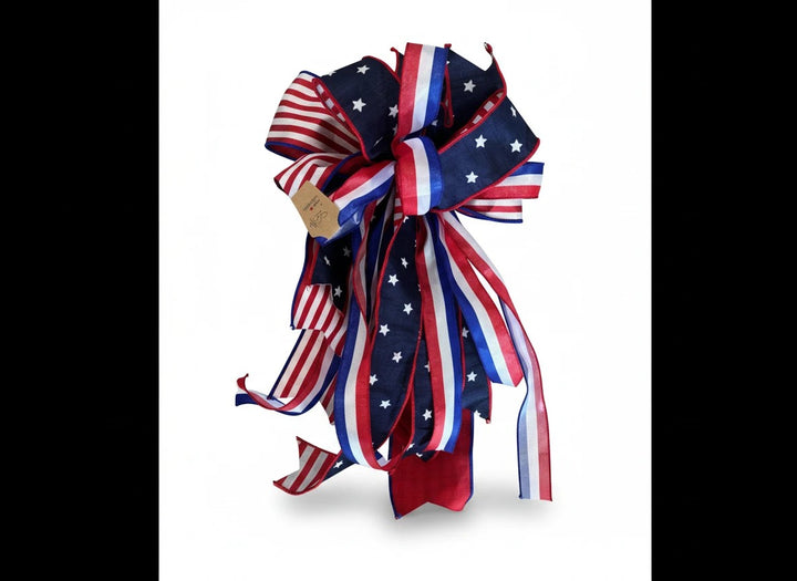 Chic Collective patriotic ribbon bow with red, white, and blue stars and stripes for holiday wreath decor.