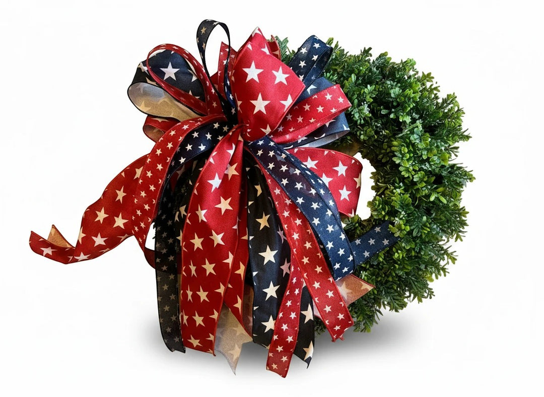 Chic Collective Patriotic Star Ribbon Wreath Decoration with red, white, and blue ribbons featuring white stars.