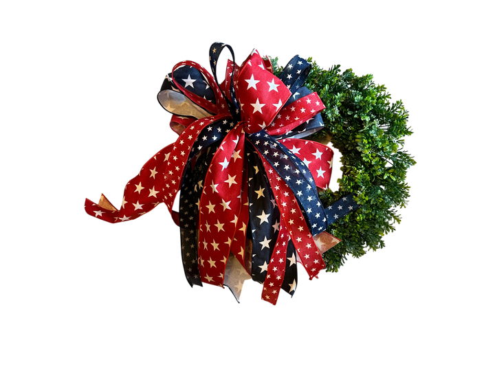 Chic Collective Patriotic Star Ribbon Wreath Decoration with red, white, and blue ribbons featuring white stars.