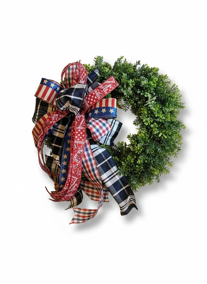 Chic Collective patriotic wreath bow with red, white, and blue plaid and star patterns.