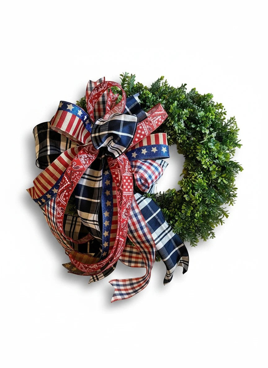 Chic Collective patriotic wreath bow with red, white, and blue plaid and star ribbon accents.