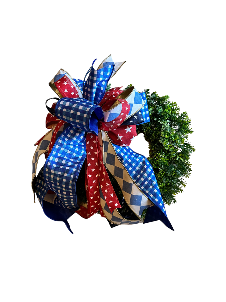 Chic Collective patriotic bow with red, white, and blue ribbons featuring stars and gingham patterns for a wreath.