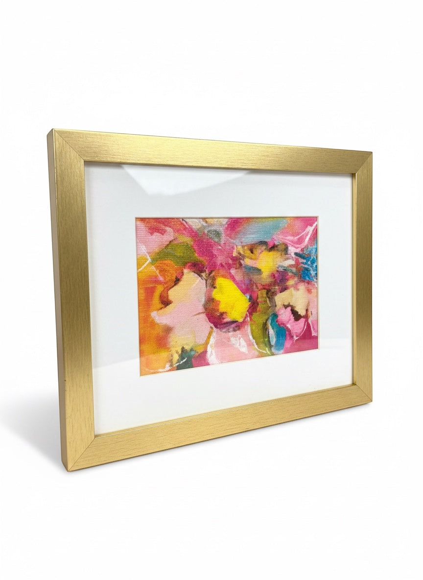 Chic Collective Petals in Motion abstract floral art with blush pink, yellow, coral, turquoise, and peach hues in a gold frame.