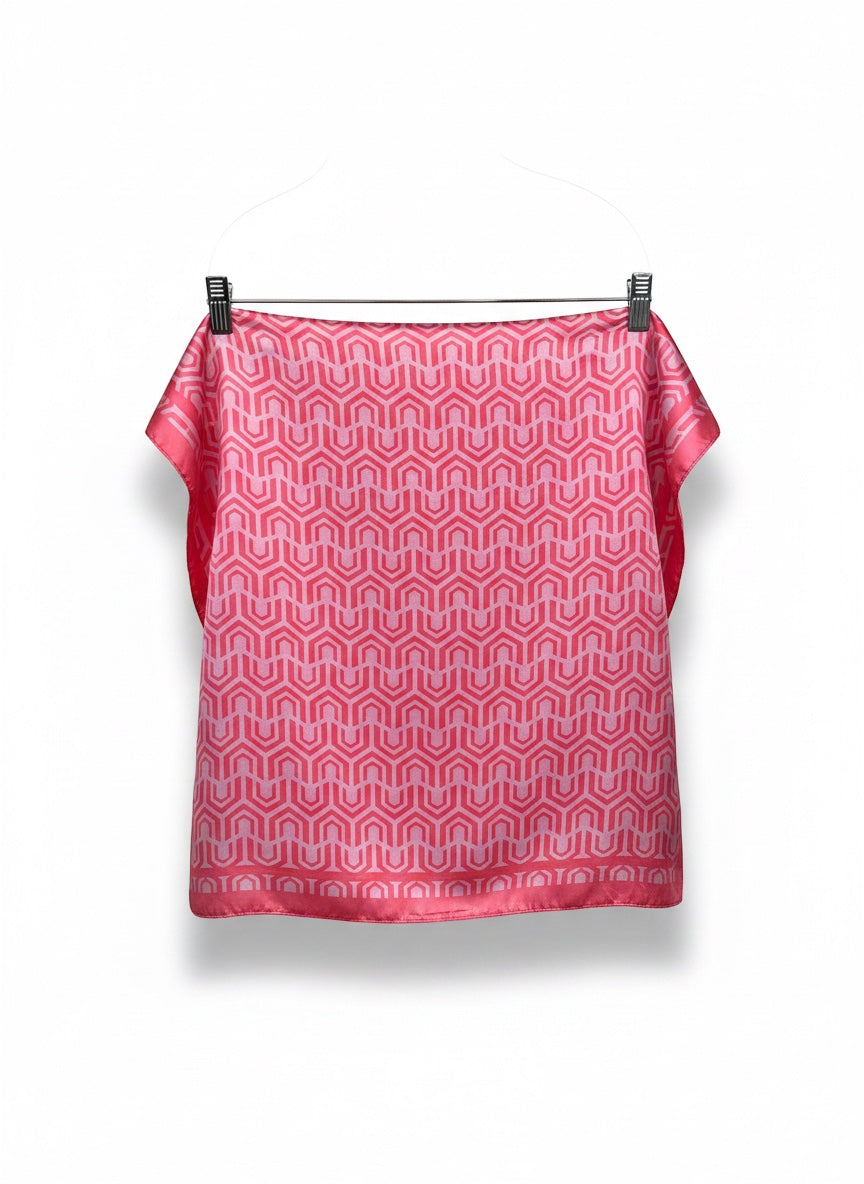 Chic Collective pink and coral geometric pattern satin scarf with a glossy finish.