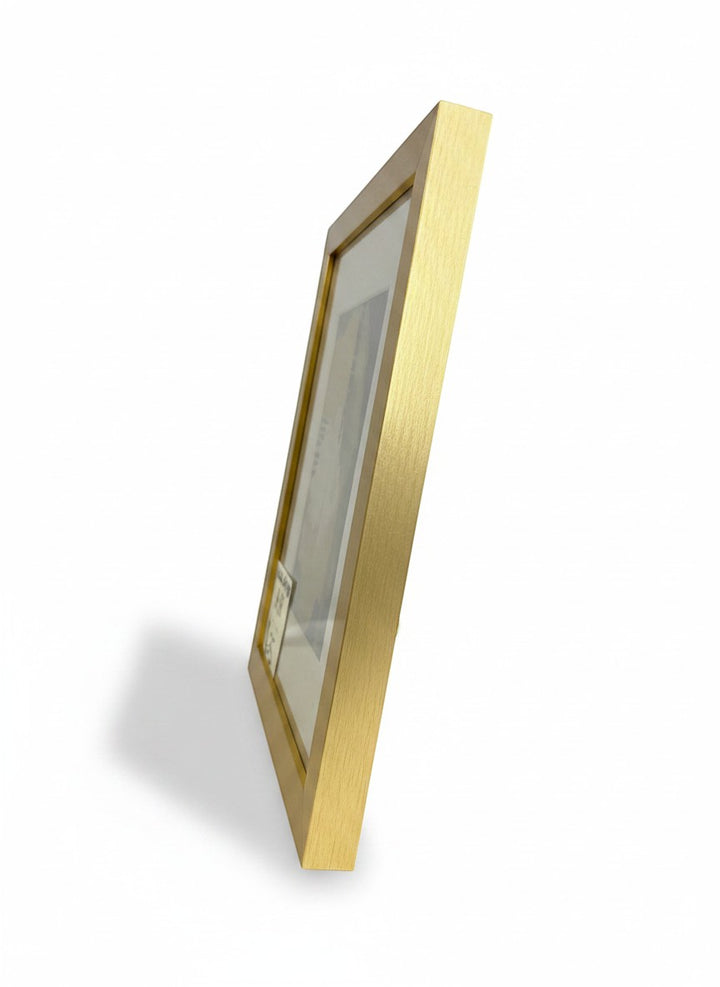 Chic Collective Quiet Composition framed art with brushed gold frame, featuring abstract linear details in muted earth tones.