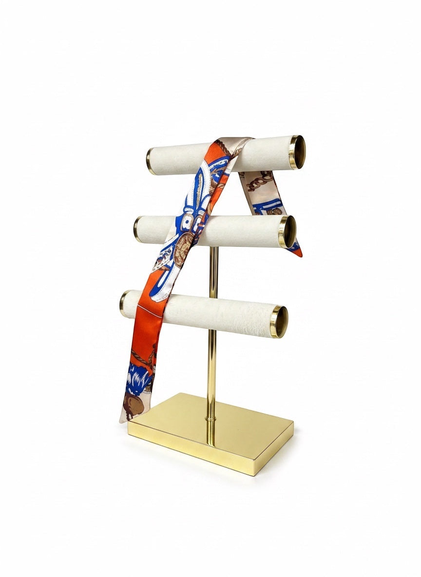 Chic Collective Riviera Luxe Ribbon Tie scarf with equestrian print in orange, blue, and ivory.