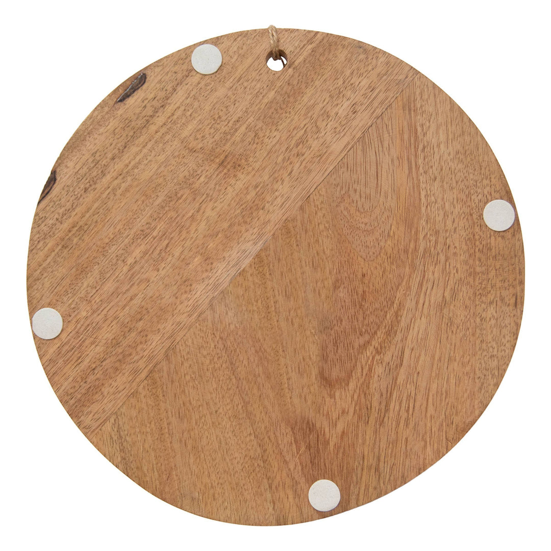 Chic Collective Clement round acacia wood cutting board with white resin inlay and jute hanger.