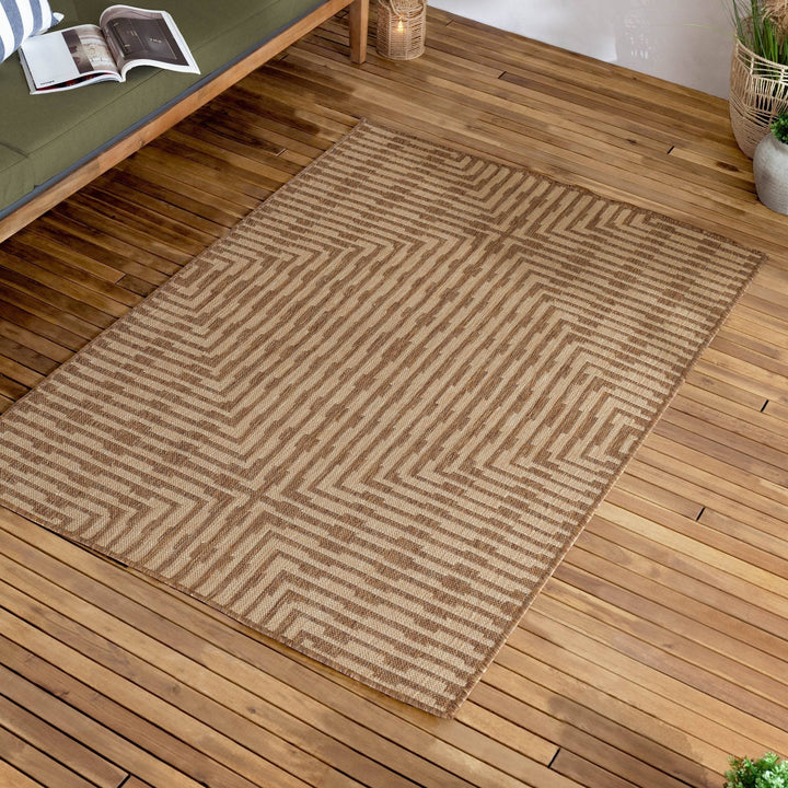Chic Collective Sandown natural jute effect rug with geometric diamond pattern, 100% polyester, suitable for indoor/outdoor use.
