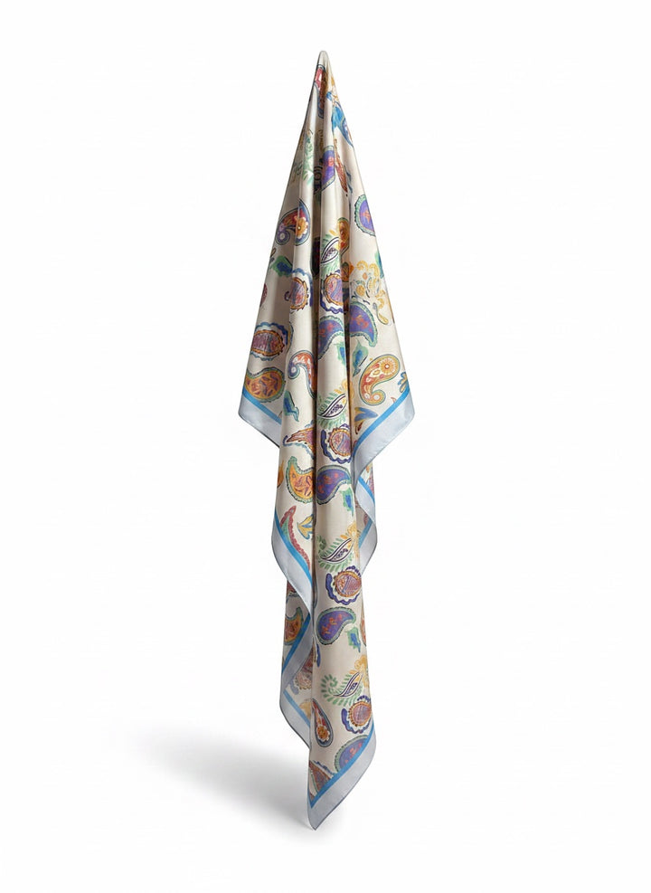 Chic Collective Santorini Paisley Scarf with turquoise, coral, marigold, periwinkle, and sage paisley print on ivory with blue trim.