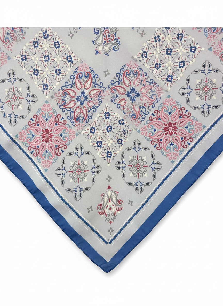 Chic Collective Santorini Tile Scarf with blue, pink, and gray ornamental motifs on ivory.