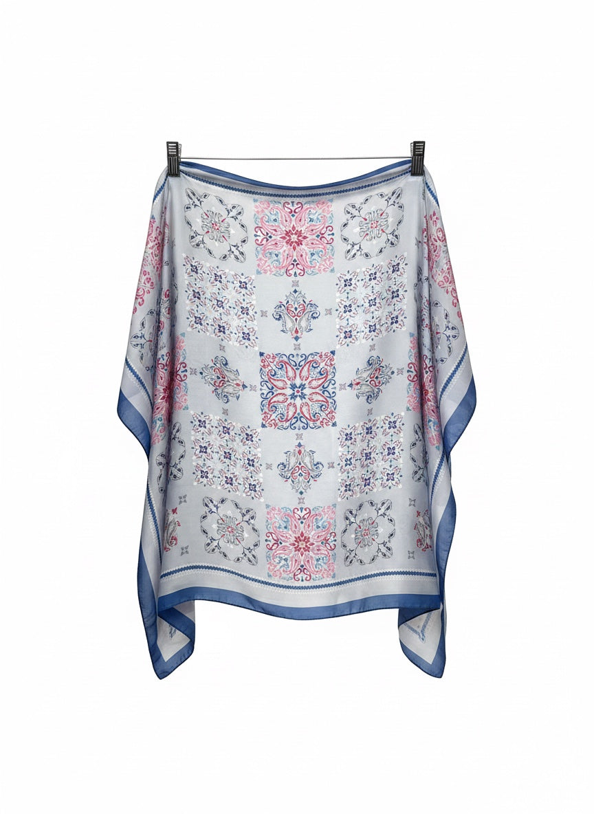 Chic Collective Santorini Tile Scarf in ivory with blue, pink, and gray ornamental motifs. Lightweight fabric.