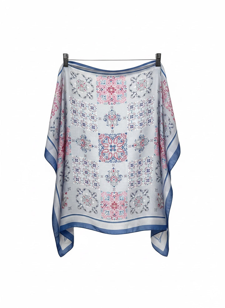 Chic Collective Santorini Tile Scarf in ivory with blue, pink, and gray ornamental motifs. Lightweight fabric.