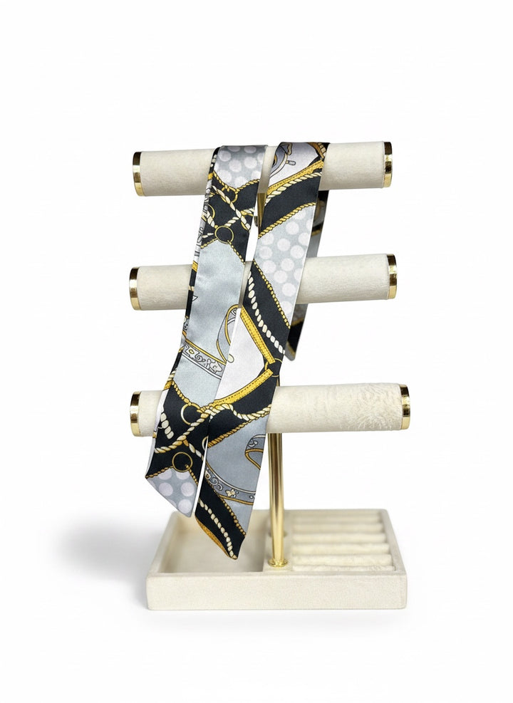 Chic Collective silk twilly scarf with chain and equestrian print in silver, black, and gold.