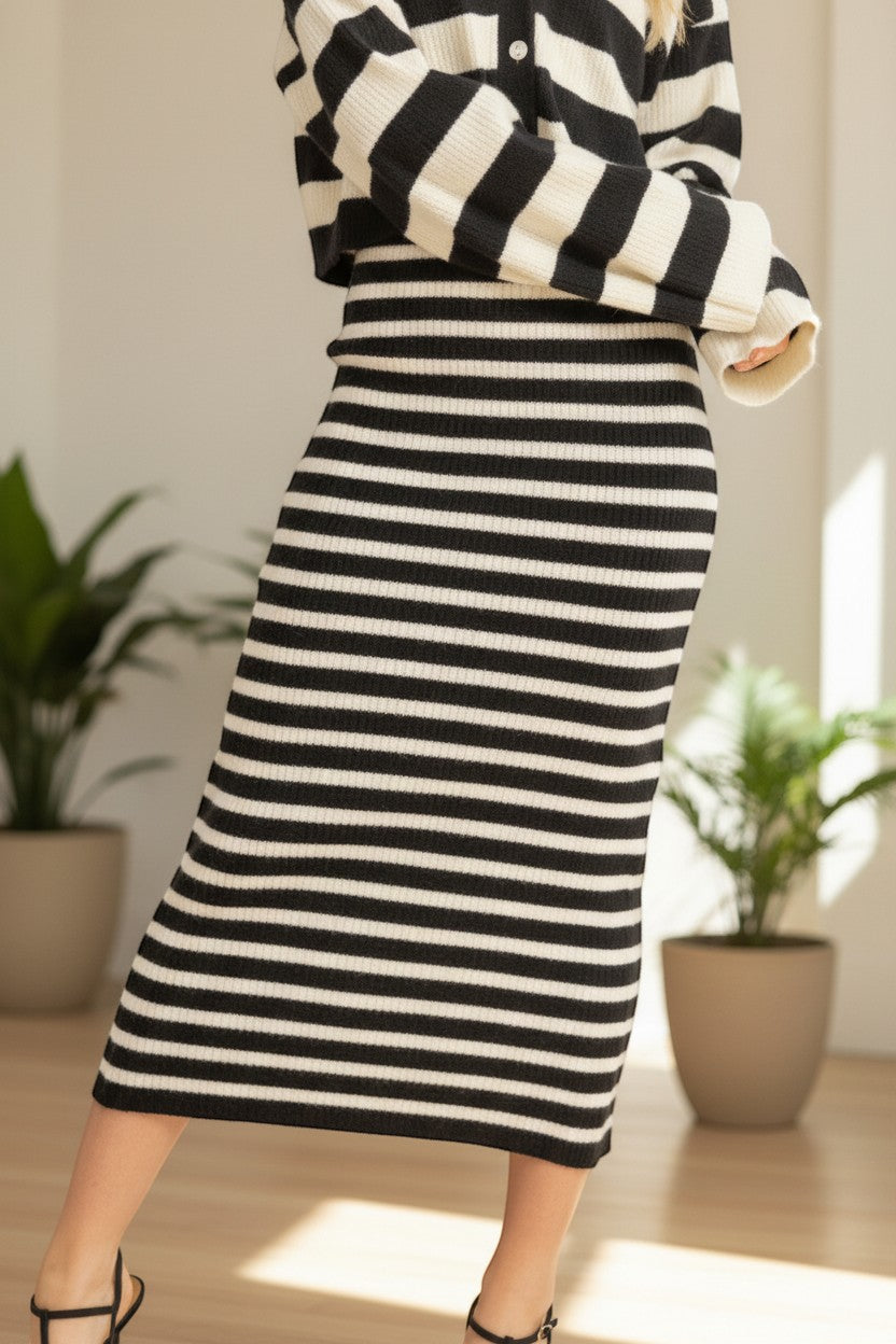 Chic Collective black and white striped knit midi skirt and matching cardigan set.