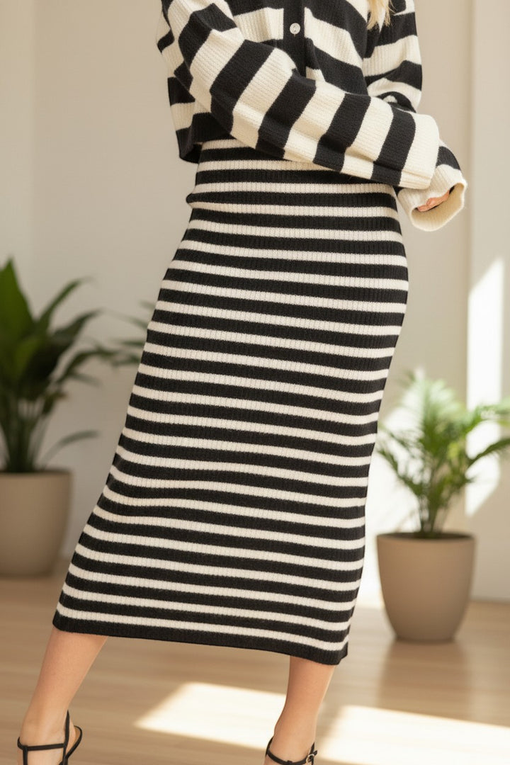 Chic Collective black and white striped knit midi skirt and matching cardigan set.