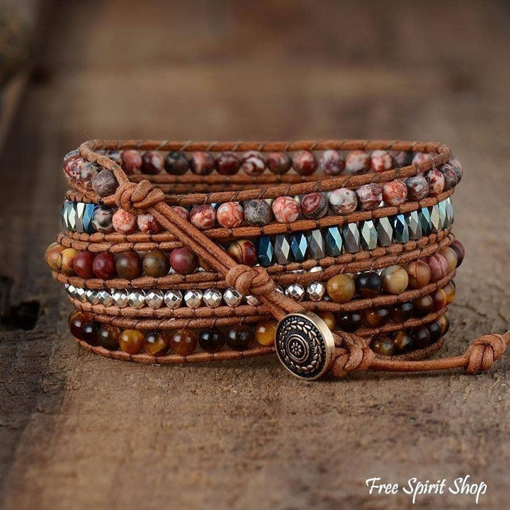 Chic Collective natural tiger eye and jasper beaded wrap bracelet on genuine leather with silver accents and a brass button closure.