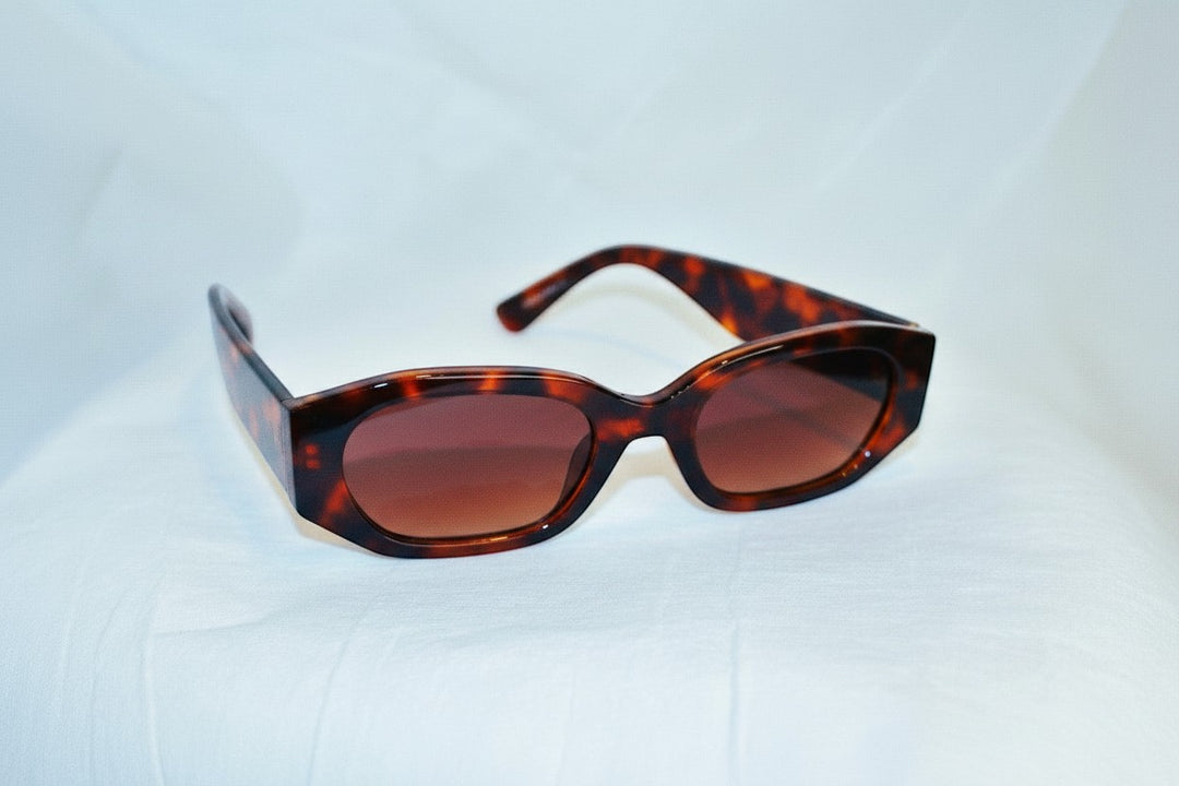 Chic Collective geometric frame sunglasses with tortoise shell pattern and gradient brown lenses.
