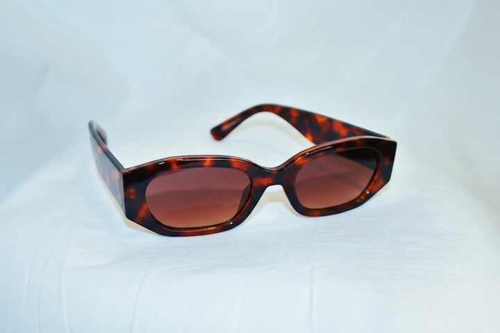 Chic Collective geometric frame sunglasses with tortoise shell pattern and gradient brown lenses.