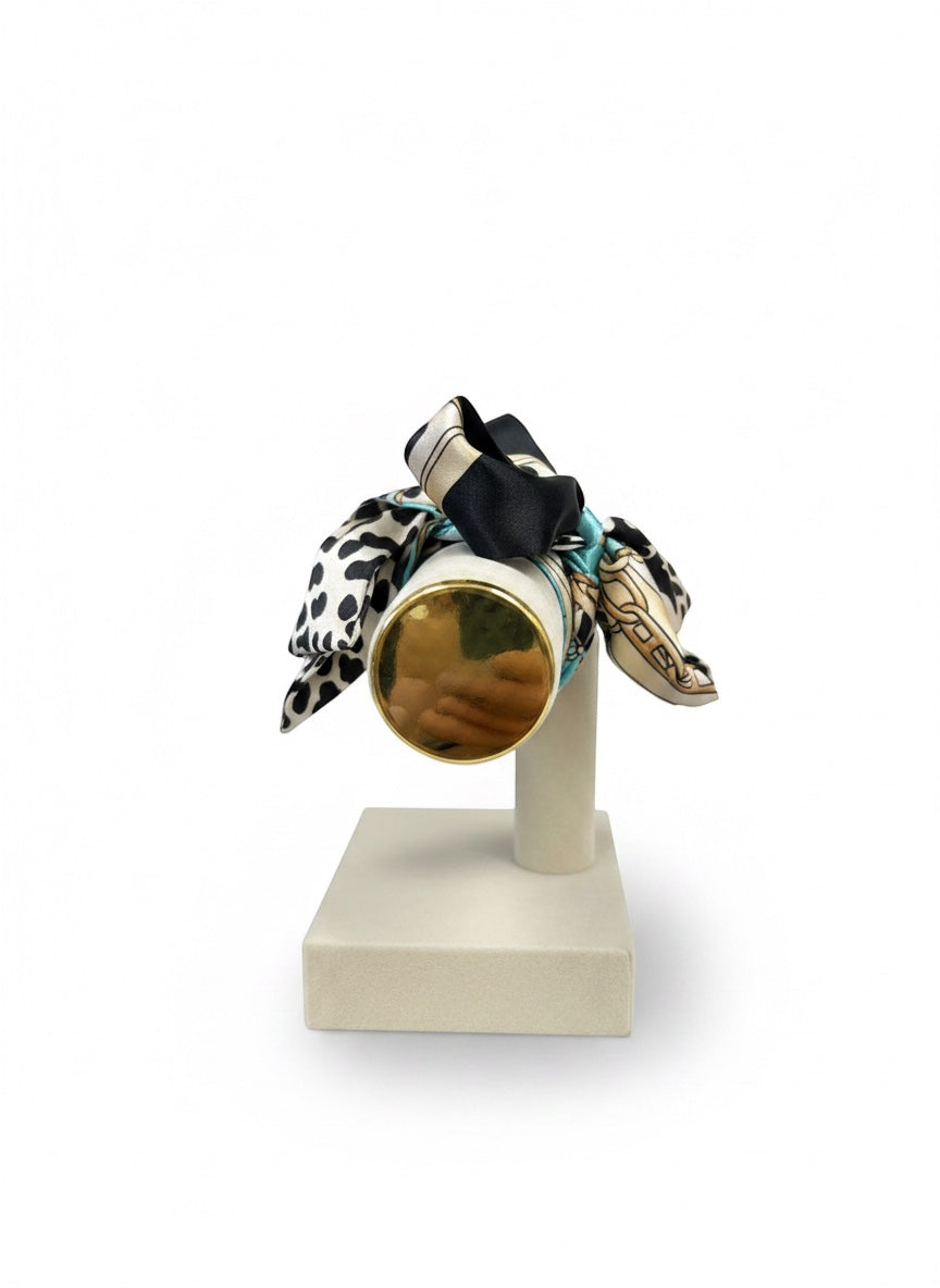 Chic Collective Uptown Wild Tie Scarf: black, white, and turquoise animal print and chain pattern silk scarf.