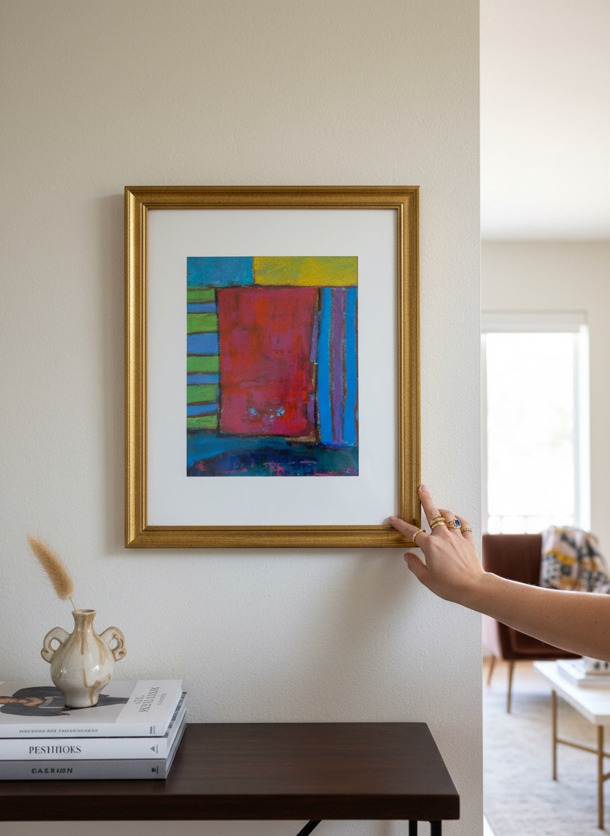 Chic Collective Velvet Rhythm abstract art with bold color blocking in crimson, blue, green, and yellow, framed in gold.