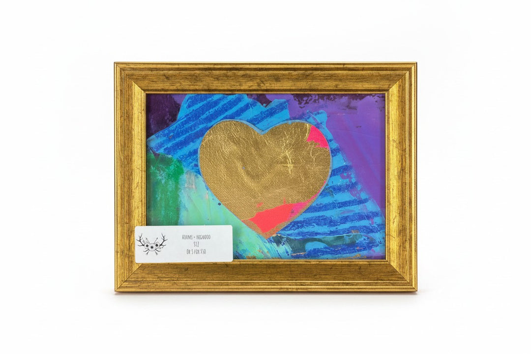 Chic Collective Violet Flight mini artwork with gold heart silhouette on vibrant abstract background in gold frame.