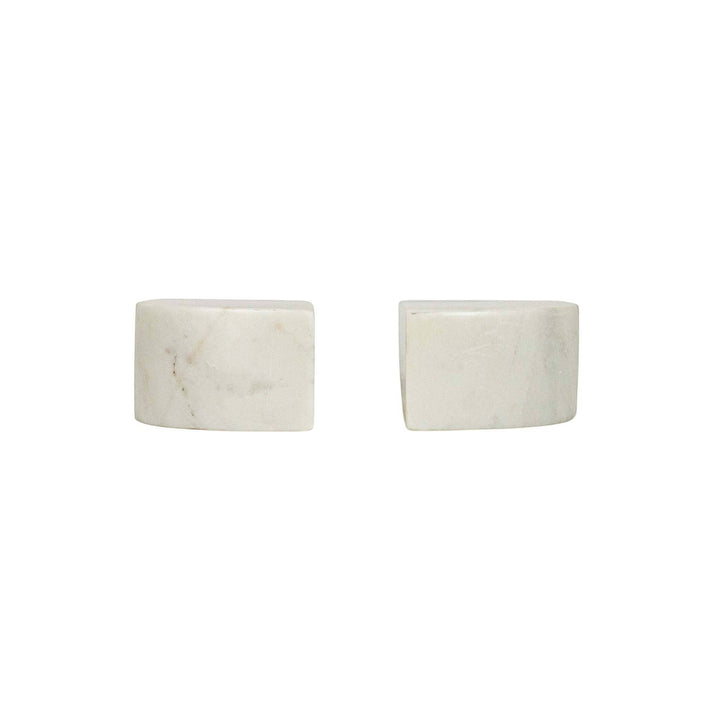 Chic Collective white marble arch bookends, set of 2. Solid marble with subtle veining and a smooth finish.