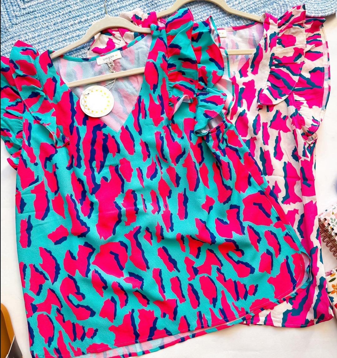 Chic Collective aqua and pink leopard print top with ruffled short sleeves and V-neck.