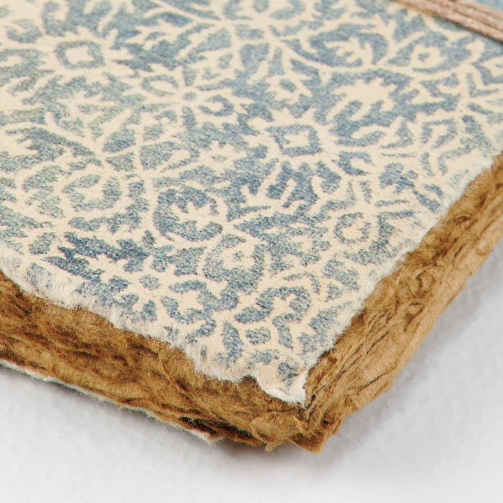 Chic Collective artisan journal with blue and cream patterned cover and deckled edges.