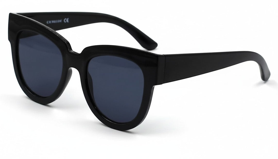 Chic Collective black acetate cat-eye sunglasses with dark tinted lenses and upswept frames.