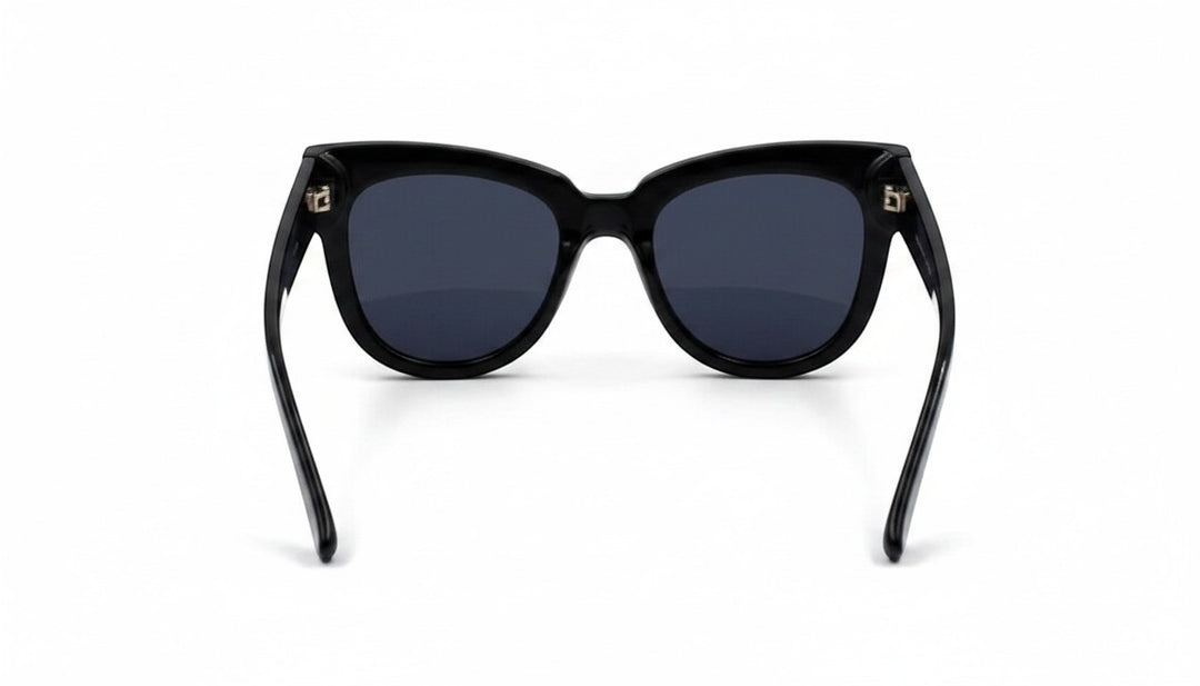 Chic Collective black acetate cat-eye sunglasses with dark tinted lenses and upswept frames.