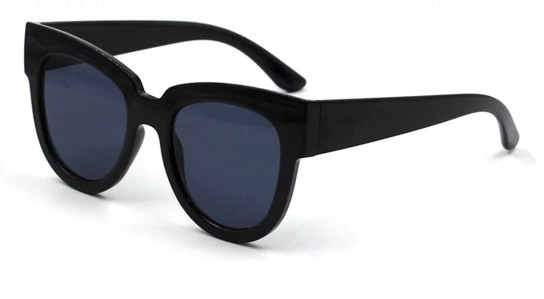 Chic Collective black acetate cat-eye sunglasses with dark tinted lenses and upswept frames.