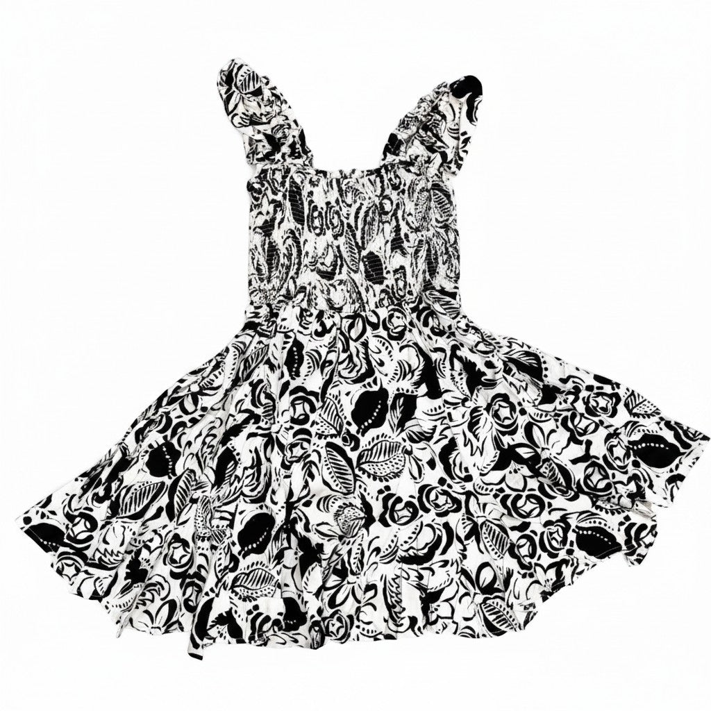 Chic Collective black and cream floral print smocked mini dress with flutter sleeves.