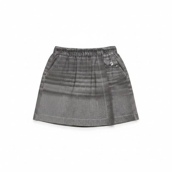 Chic Collective black denim skort with elastic waistband and side pocket. Versatile and comfortable for casual wear.