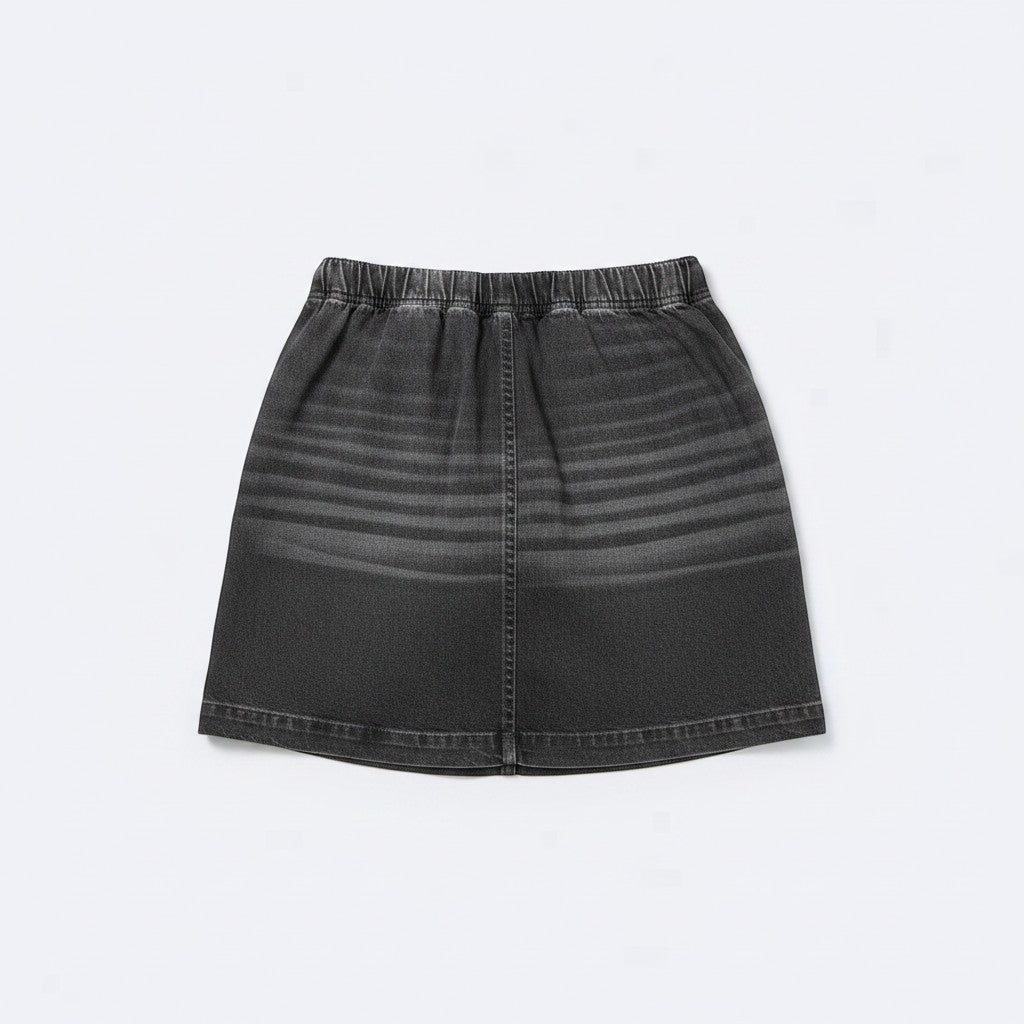 Chic Collective black denim skort with elastic waistband and horizontal faded stripe detail. Versatile and comfortable for casual wear.