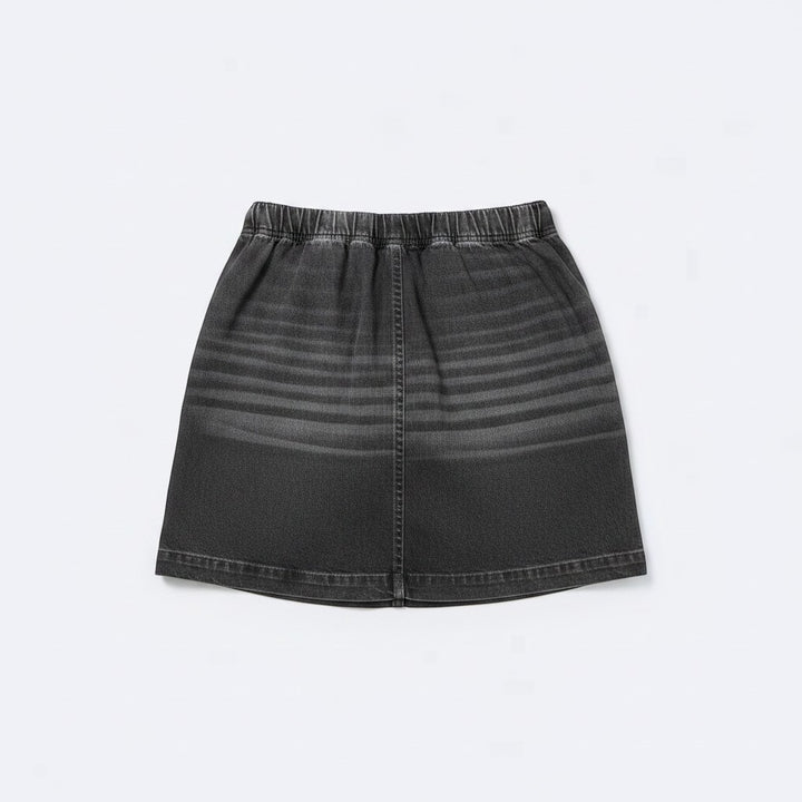 Chic Collective black denim skort with elastic waistband and horizontal faded stripe detail. Versatile and comfortable for casual wear.