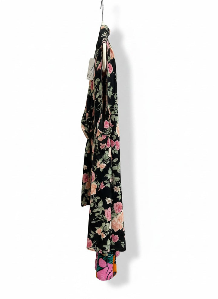 Chic Collective black sleeveless blouse with pink and green floral print, featuring a cowl neckline.