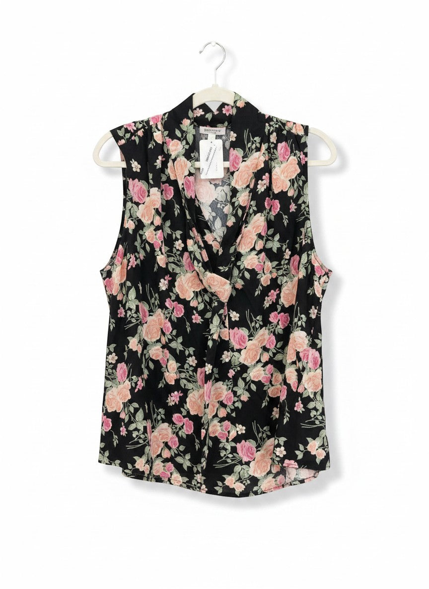 Chic Collective sleeveless black blouse with pink and peach floral print and cowl neckline.